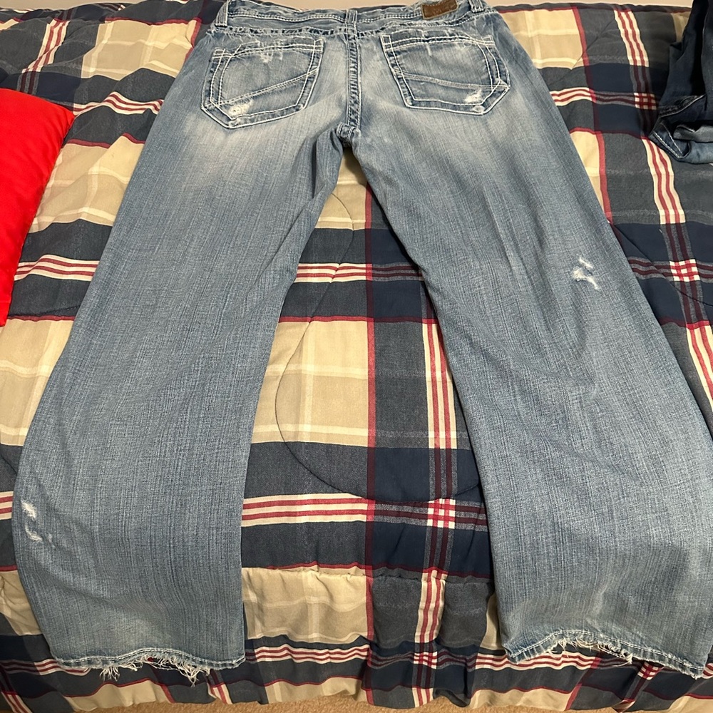 4 Pairs of Buckle Tyler straight jeans. 1 pair of Micheal Strahan jeans.